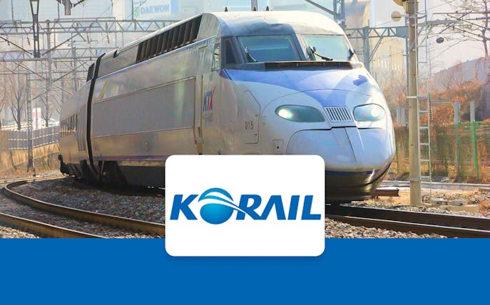 High-speed KTX train on tracks in South Korea, promoting KORAIL Pass.