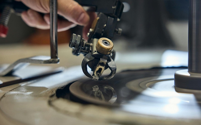 Diamond cutting process at Royal Coster Diamonds workshop.