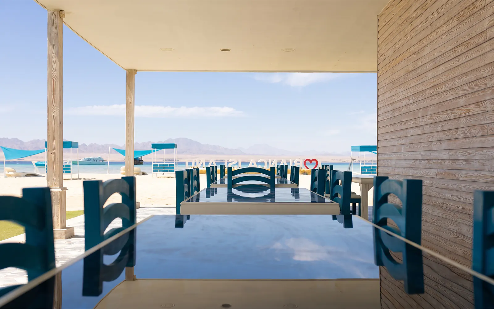 Outdoor dining area overlooking the sea on Bianca Island, Hurghada.