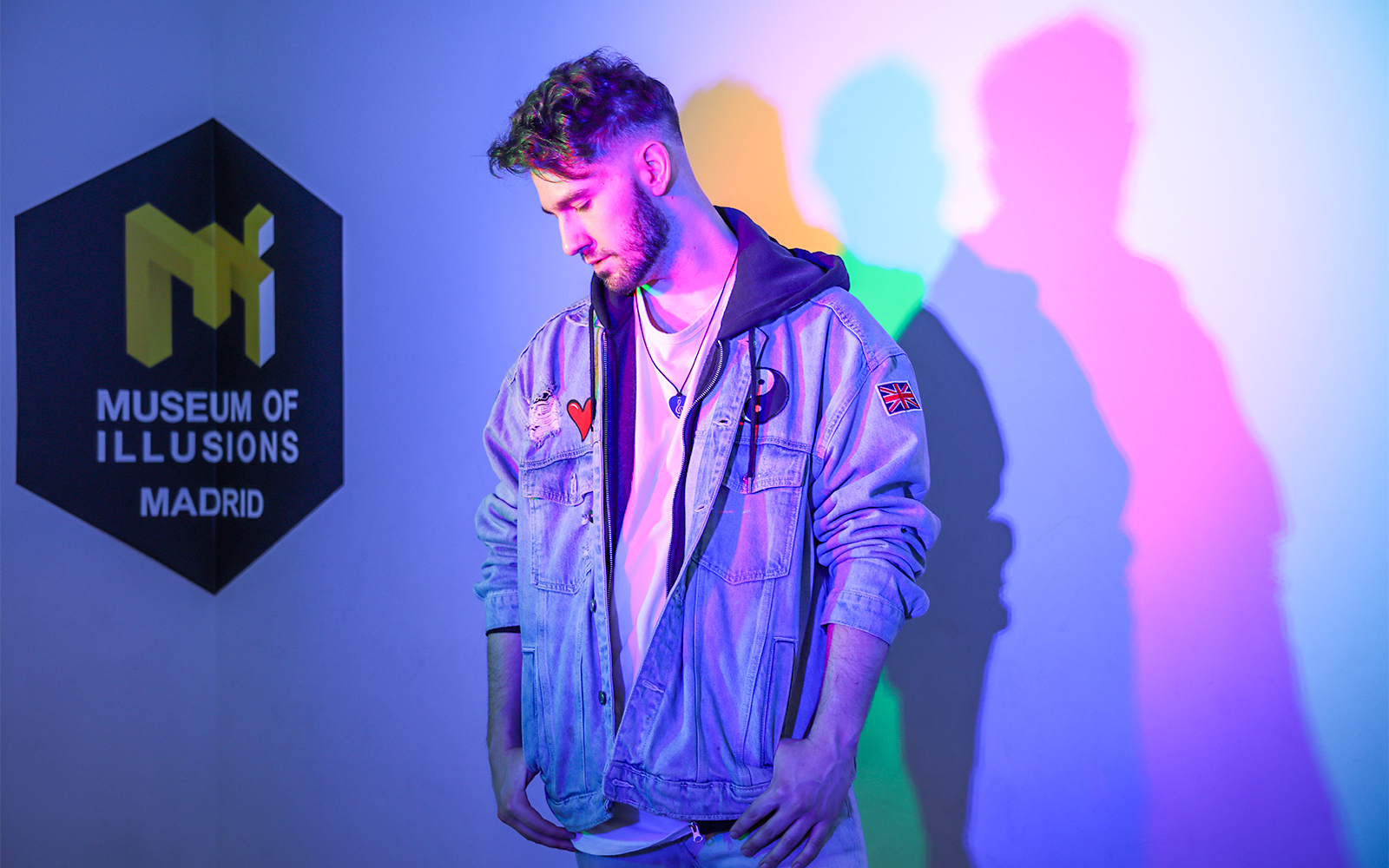 Visitors exploring interactive exhibits at Museum of Illusions Madrid.