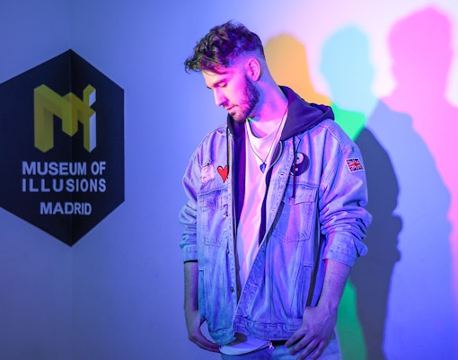 Visitors exploring interactive exhibits at Museum of Illusions Madrid.