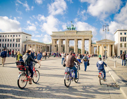 Cyclists near Brandenburg Gate in Berlin with Berlin WelcomeCard.