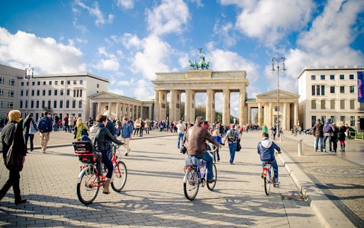 Cyclists near Brandenburg Gate in Berlin with Berlin WelcomeCard.