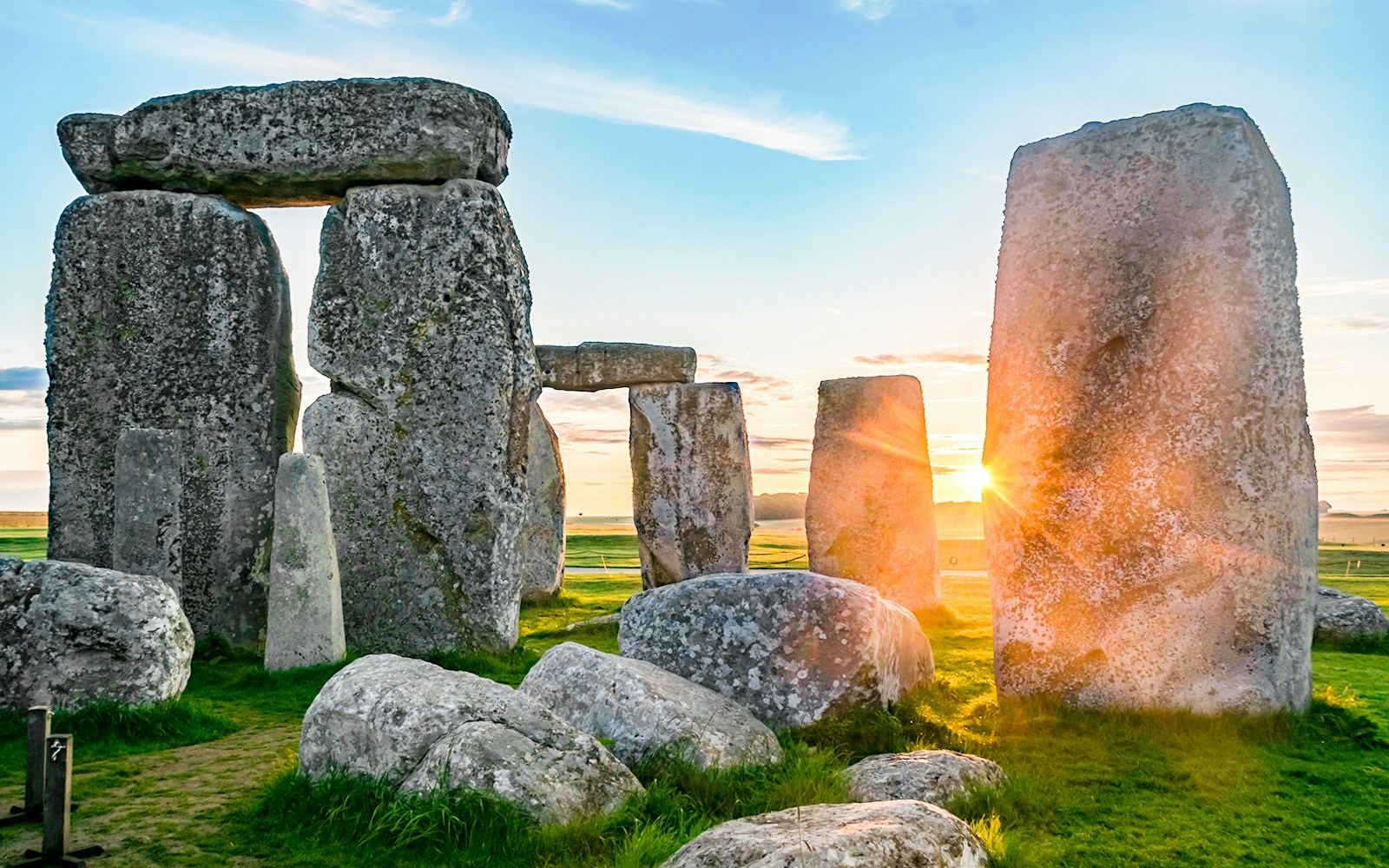 Stonehenge with tourists on a guided tour from London.