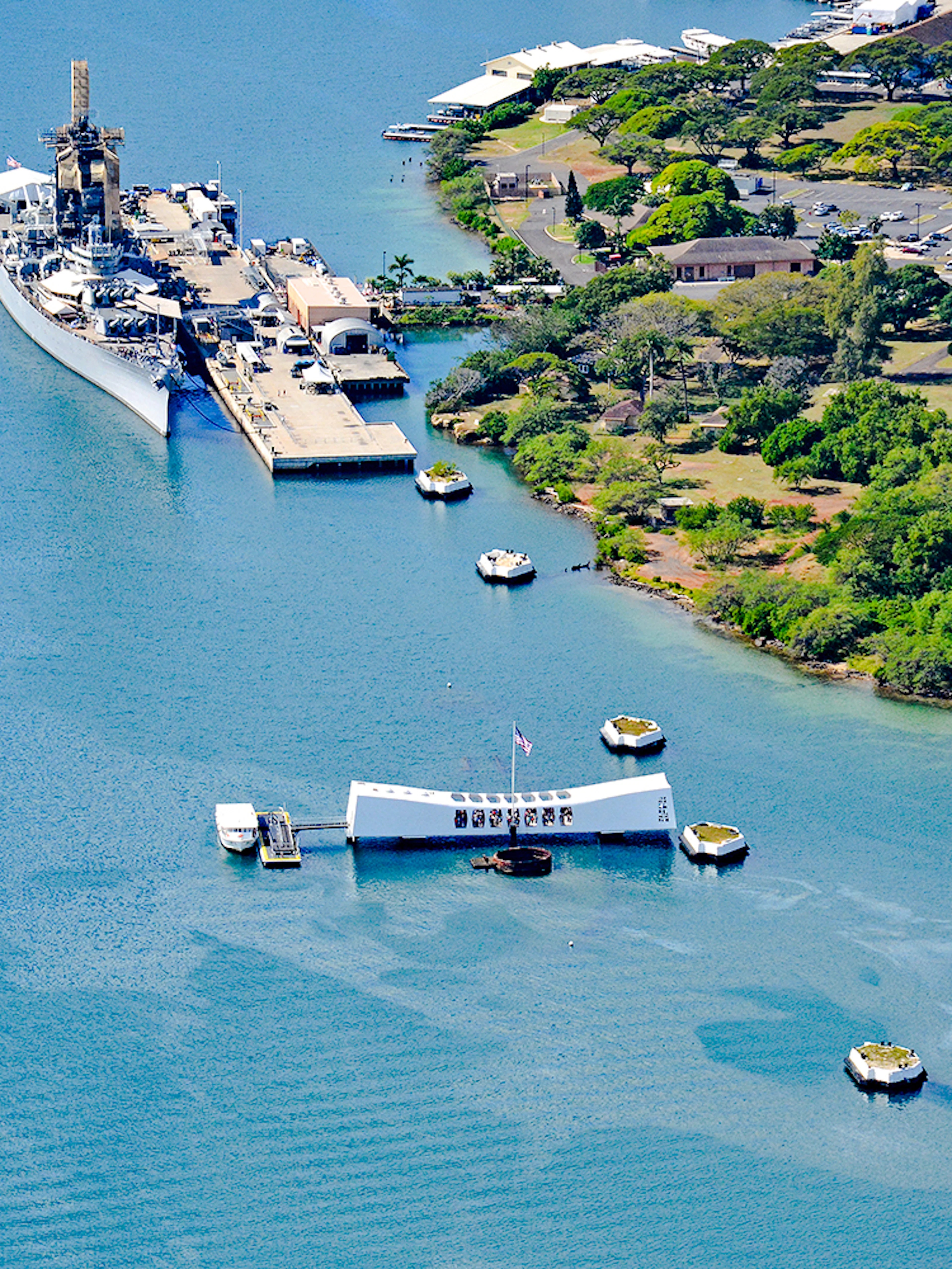 Aerial view of the Arizona Memorial with USS Missouri in Pearl Harbor, Hawaii.