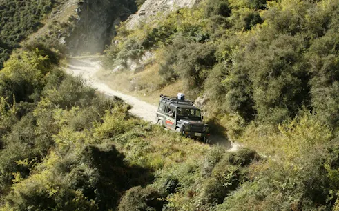 4WD vehicle navigating rugged trail in Macetown, Queenstown.