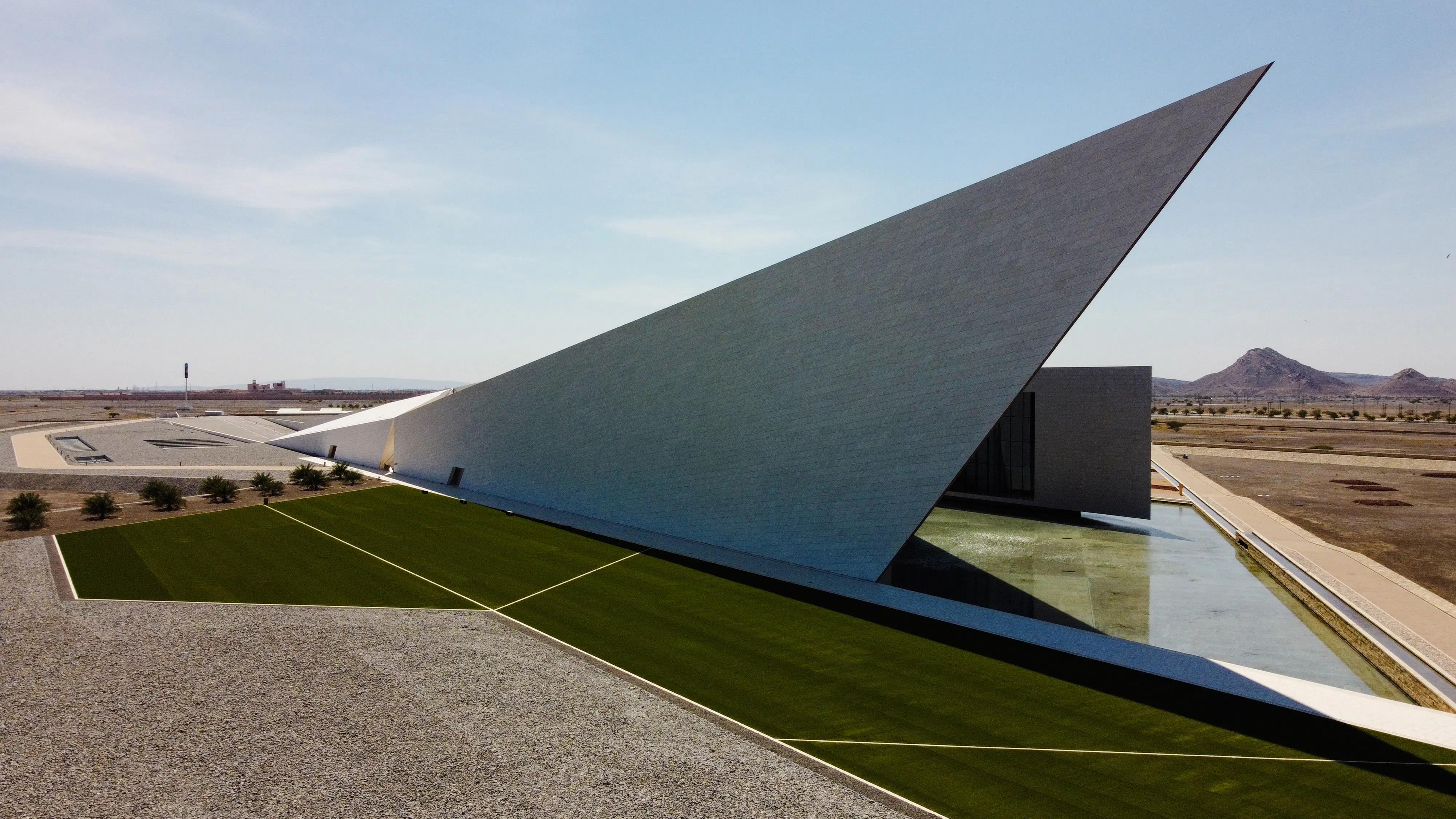 Modern architectural structure with sharp angles in Muscat, Oman, part of Nizwa and Oman's Historical Gems Tour.