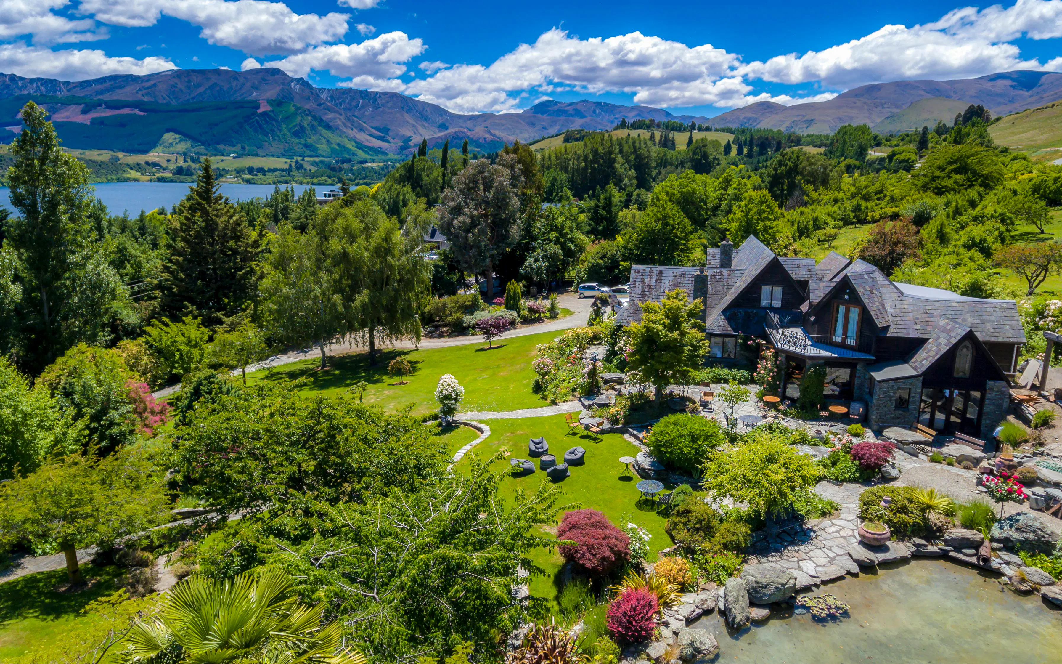 Queenstown vineyard estate with gardens and mountain views.
