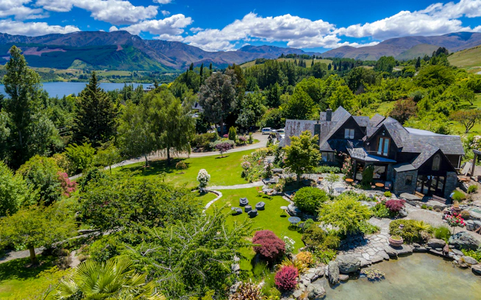 Queenstown vineyard estate with gardens and mountain views.