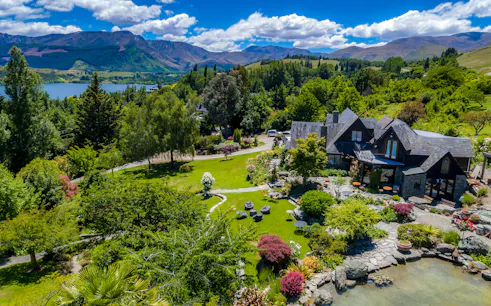 Queenstown vineyard estate with gardens and mountain views.