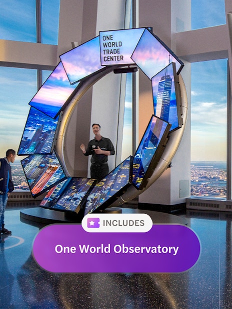 One World Observatory interior with digital display and city view, New York.