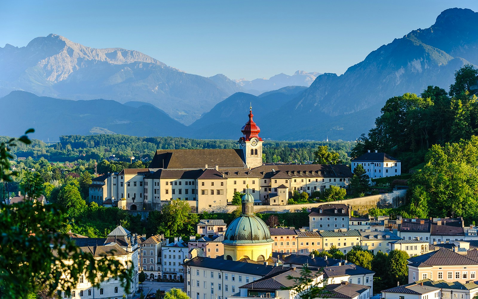 Nonnberg Abbey with mountains in Salzburg, Austria.