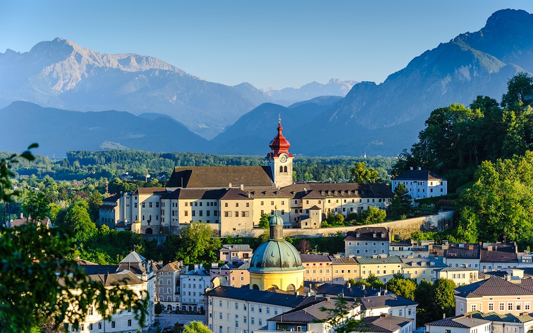 Nonnberg Abbey with mountains in Salzburg, Austria.