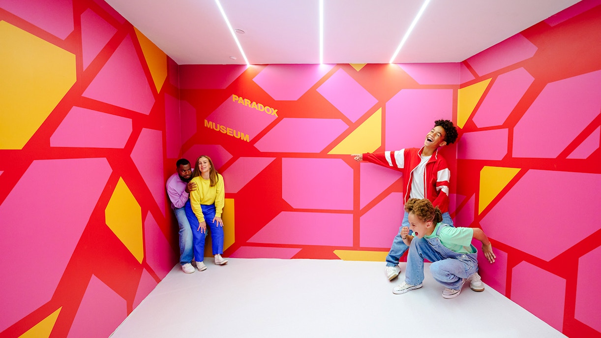 Guests enjoying an interactive exhibit at the Paradox Museum London.