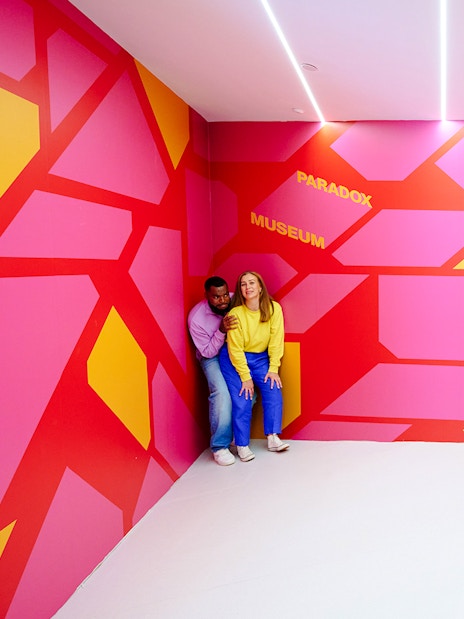 Guests enjoying an interactive exhibit at the Paradox Museum London.