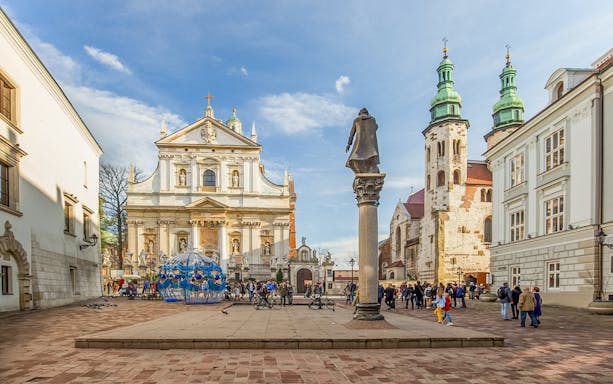 Wawel Cathedral exterior with tourists in Krakow, Poland.