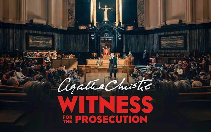 Courtroom scene from "Witness for the Prosecution" play with audience and judge.
