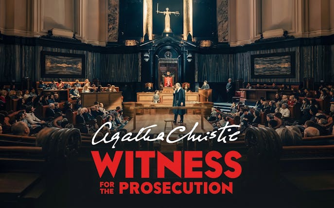 Courtroom scene from "Witness for the Prosecution" play with audience and judge.