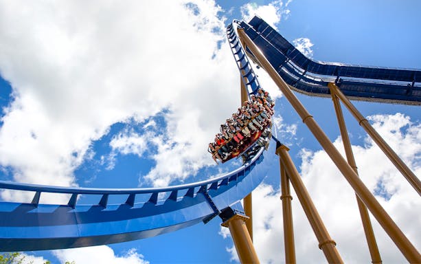 Roller coaster riders on Wrath of Rakshasa at Six Flags Great America.
