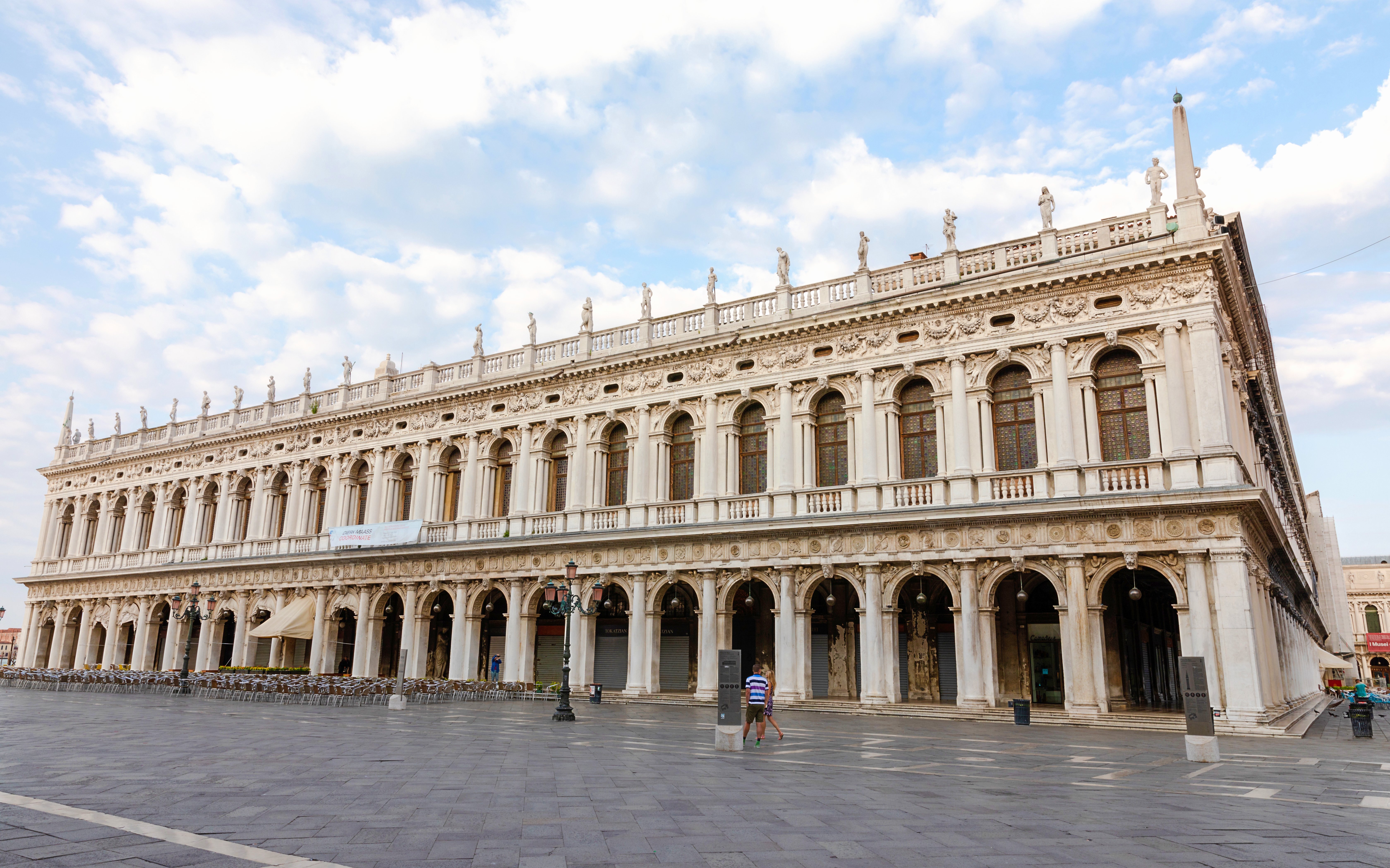 Panoramic view of Museo Correr facade in Venice, showcasing neoclassical architecture.
