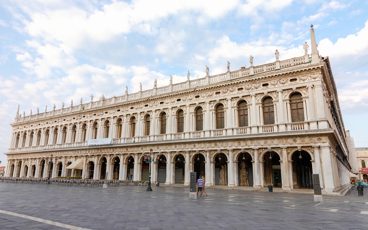 Panoramic view of Museo Correr facade in Venice, showcasing neoclassical architecture.
