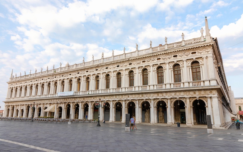 Panoramic view of Museo Correr facade in Venice, showcasing neoclassical architecture.