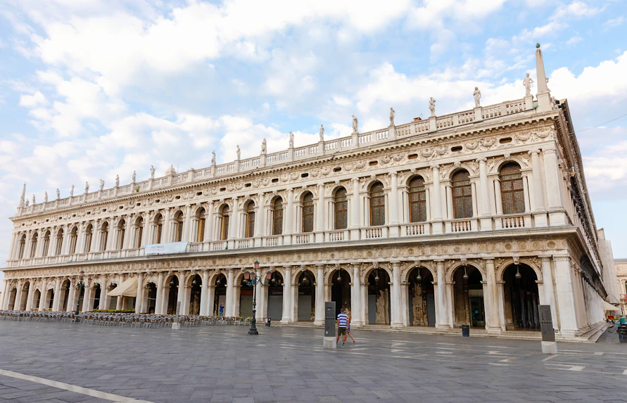 Panoramic view of Museo Correr facade in Venice, showcasing neoclassical architecture.