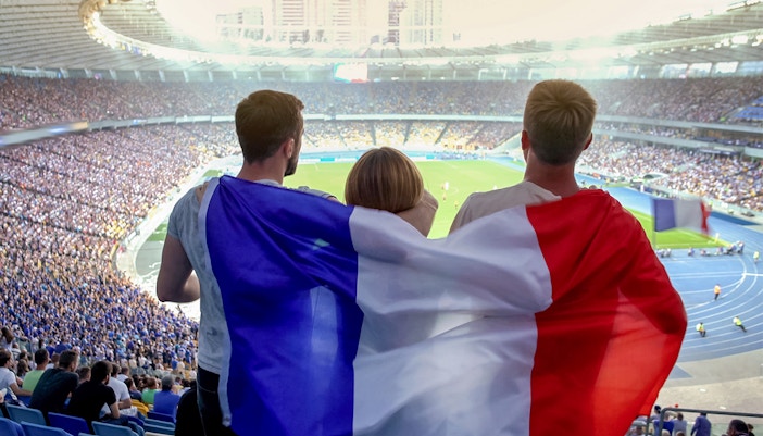 Visitors enjoying football at stadium