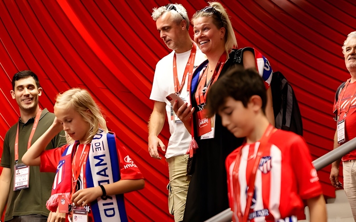 Tourists exploring Cívitas Metropolitano stadium during a guided tour.