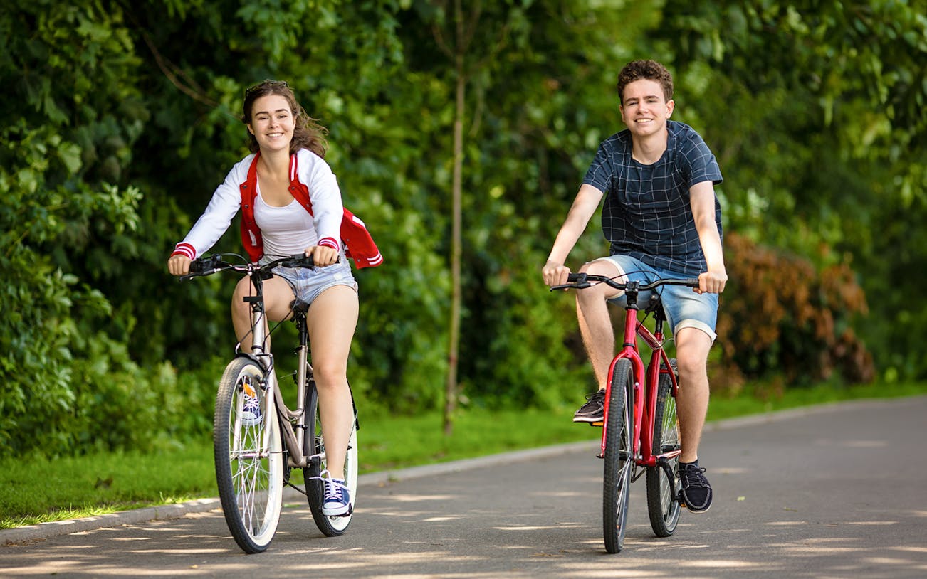 Cyclists enjoying a guided bike tour through Mitte and Tiergarten in Berlin.