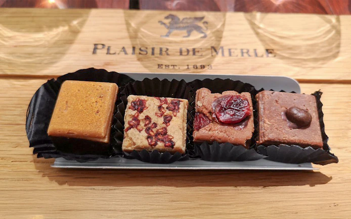 Cookies and snacks for wine tasting on Franschhoek Wine Tram Xplorer Tour, Cape Town.