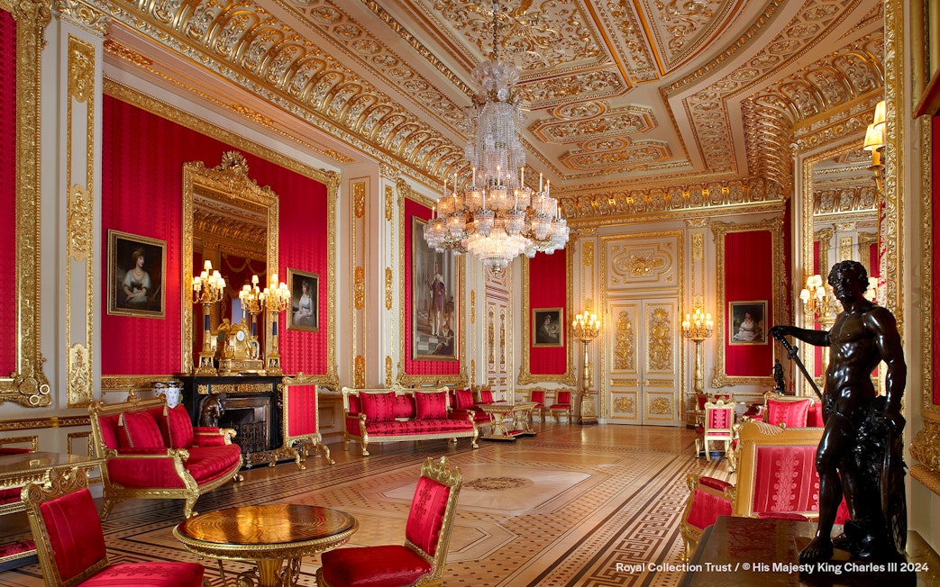 Crimson Drawing Room with ornate gold decor and chandeliers, Windsor Castle.