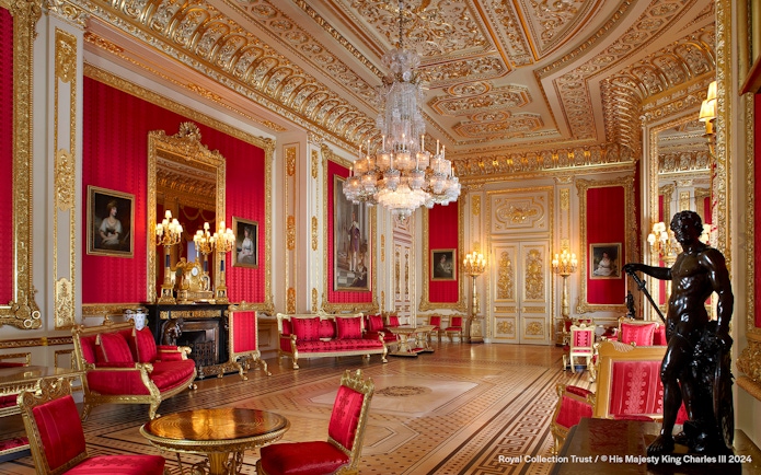 Crimson Drawing Room with ornate gold decor and chandeliers, Windsor Castle.