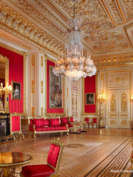 Crimson Drawing Room with ornate gold decor and chandeliers, Windsor Castle.