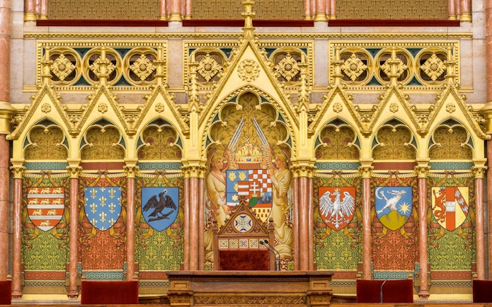 Hungarian Parliament interior with ornate coats of arms, Budapest audio tour.