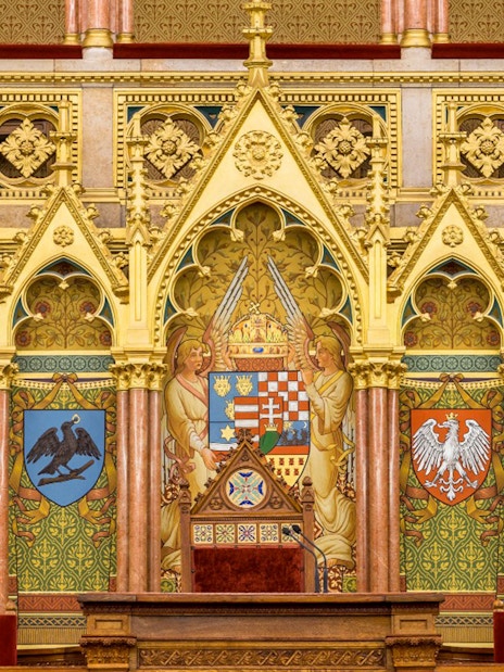 Hungarian Parliament interior with ornate coats of arms, Budapest audio tour.