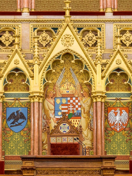 Hungarian Parliament interior with ornate coats of arms, Budapest audio tour.