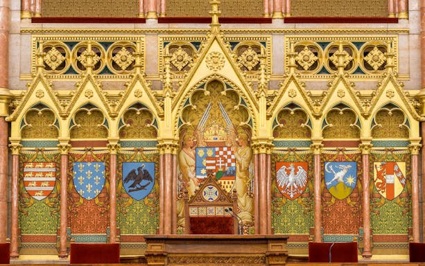 Hungarian Parliament interior with ornate coats of arms, Budapest audio tour.