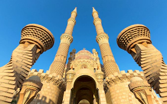 Mosque with intricate minarets in Sharm El-Sheikh, part of city tour.