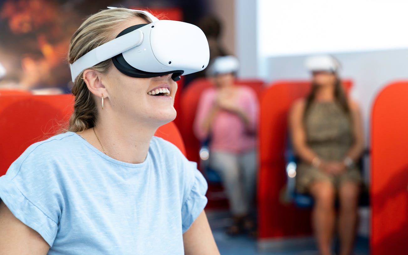 Visitors experiencing virtual reality at Darwin Royal Flying Doctor Service.