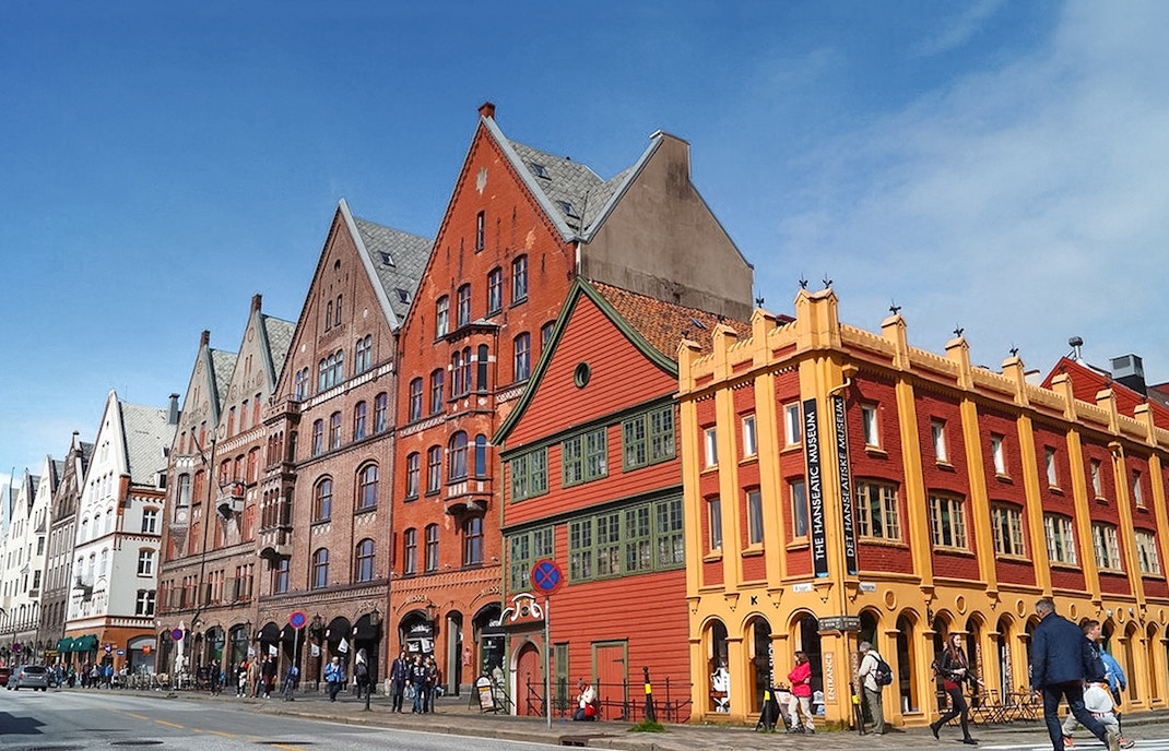 Colorful historic buildings in Bergen, Norway, along the sightseeing cruise route.