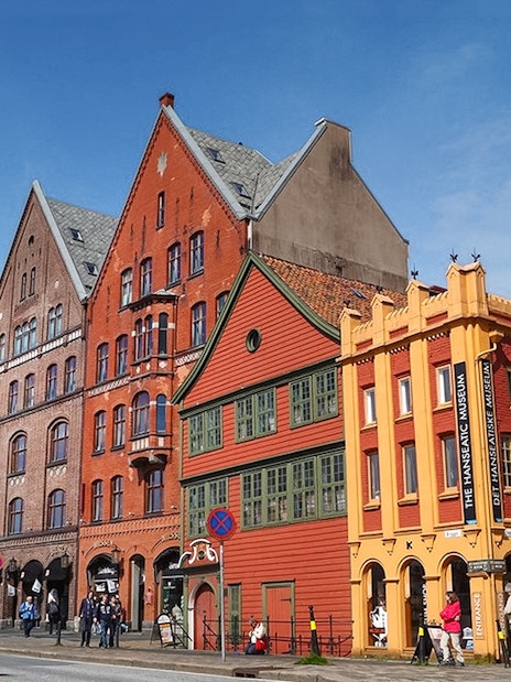 Colorful historic buildings in Bergen, Norway, along the sightseeing cruise route.