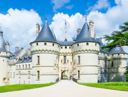 Château de Chaumont in Loire Valley, France, with its iconic turrets and stone facade.