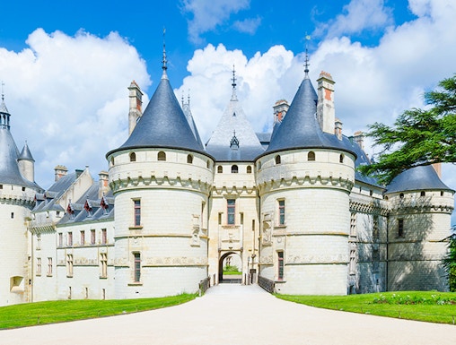 Château de Chaumont in Loire Valley, France, with its iconic turrets and stone facade.