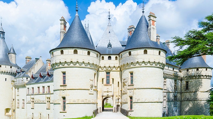 Château de Chaumont in Loire Valley, France, with its iconic turrets and stone facade.