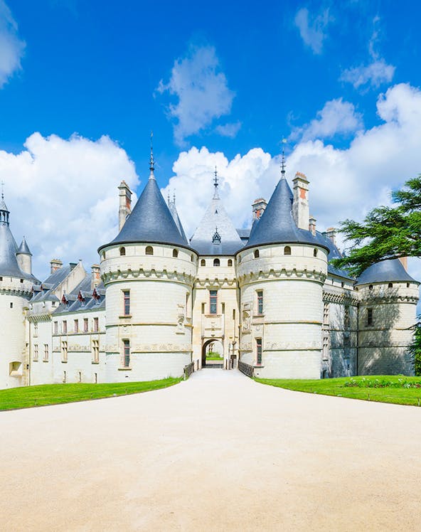 Château de Chaumont in Loire Valley, France, with its iconic turrets and stone facade.