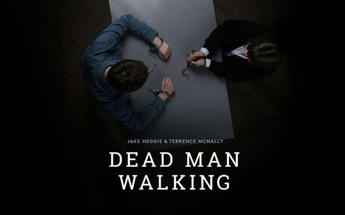 Two people in handcuffs sitting at a table, related to "Dead Man Walking.