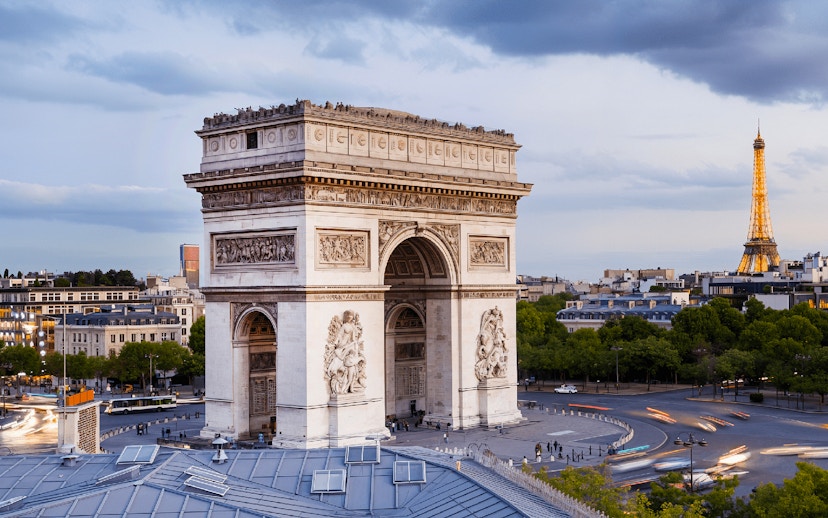 Arc de Triomphe with Eiffel Tower in background, Paris side-car tour.