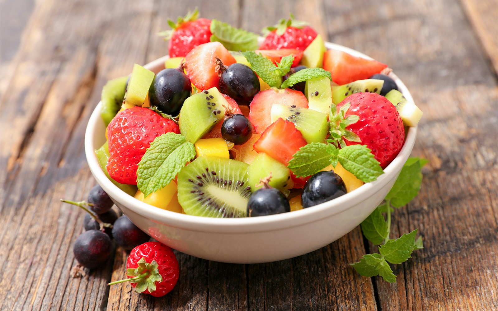 Fruit salad from the Medieval Dinner Prague menu with assorted fresh fruits.