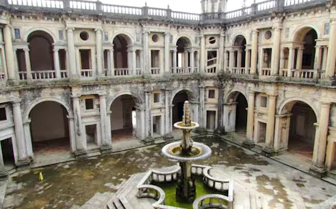 Convent of Christ courtyard with central fountain, Tomar, Portugal.